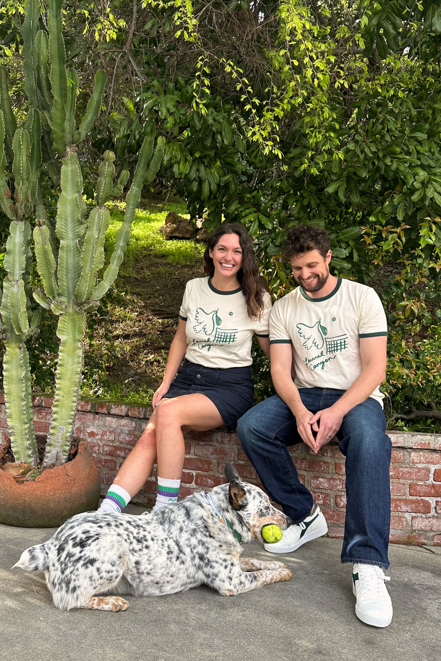 Unisex Laurel Canyon Peace Dove Tennis Ringer Tee in Cream / Dark Green