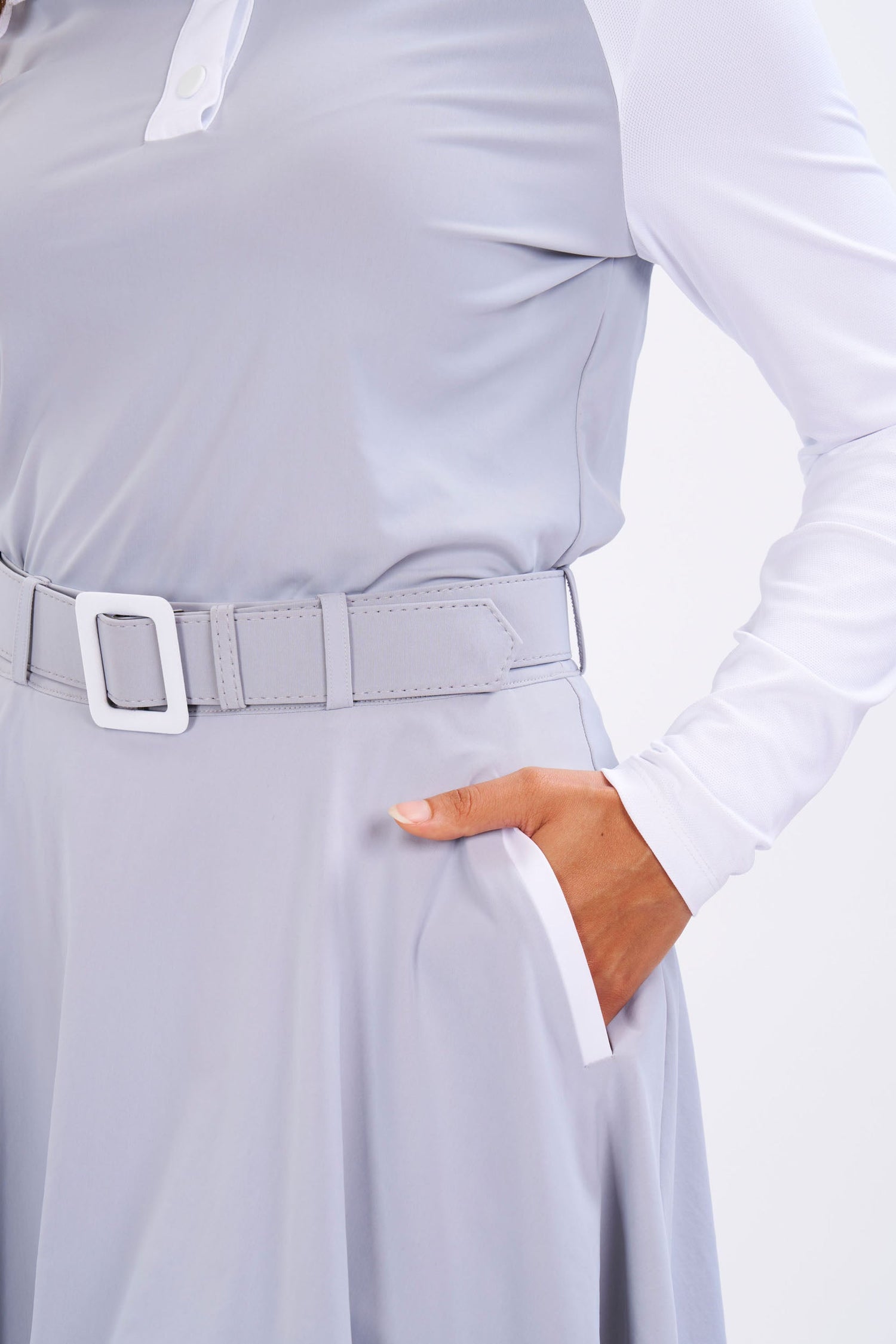 PLEATED PERFORMANCE SKORT WITH DETACHABLE BELT UPF 50+