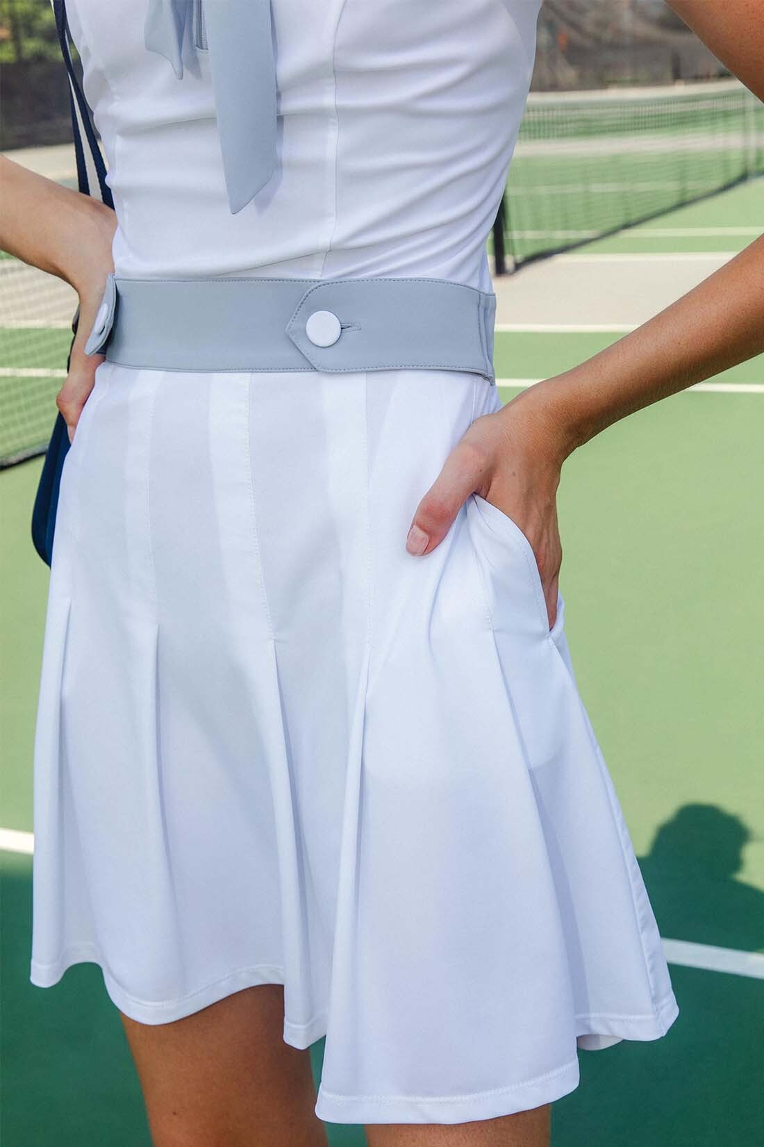 SLEEVELESS PLEATED PERFORMANCE DRESS UPF 50+