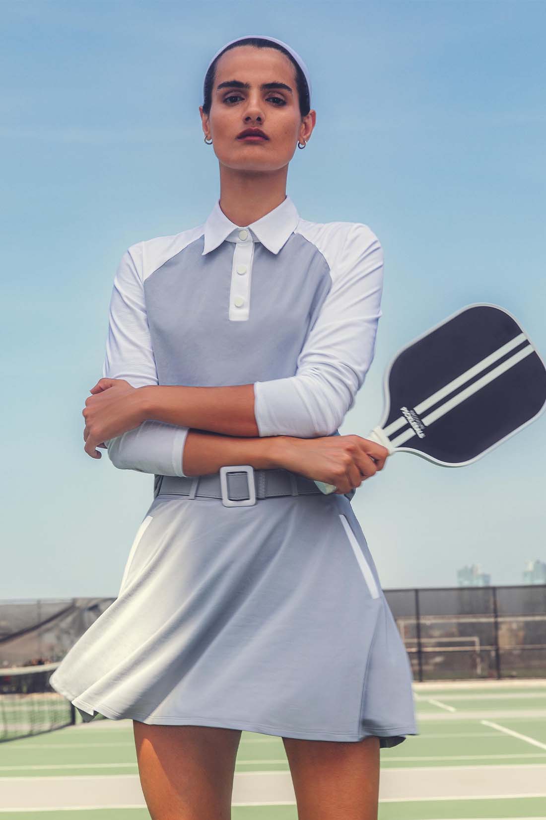 PLEATED PERFORMANCE SKORT WITH DETACHABLE BELT UPF 50+